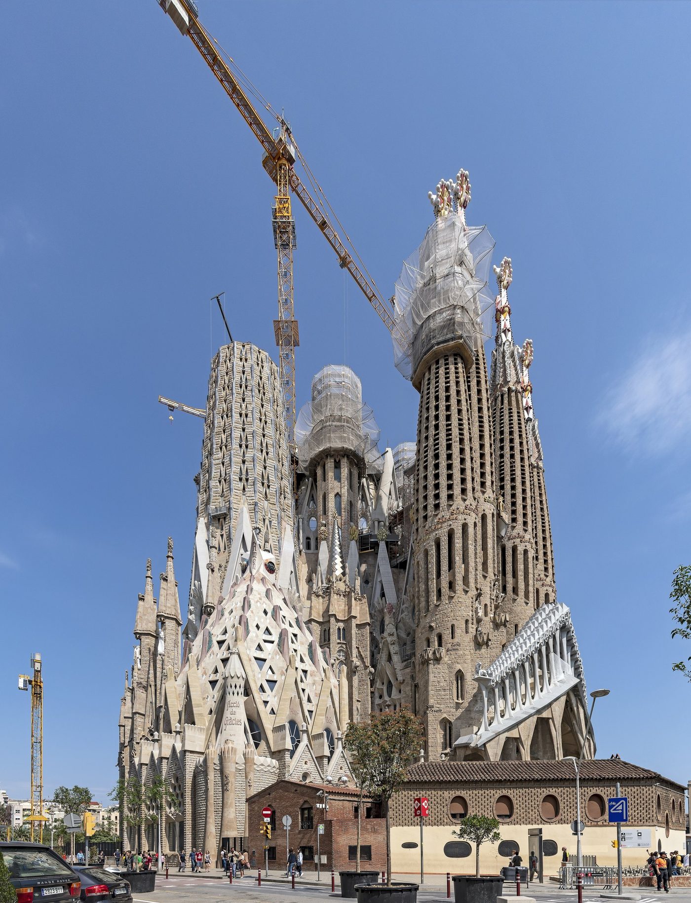 The apse from the west, with cranes and towers.