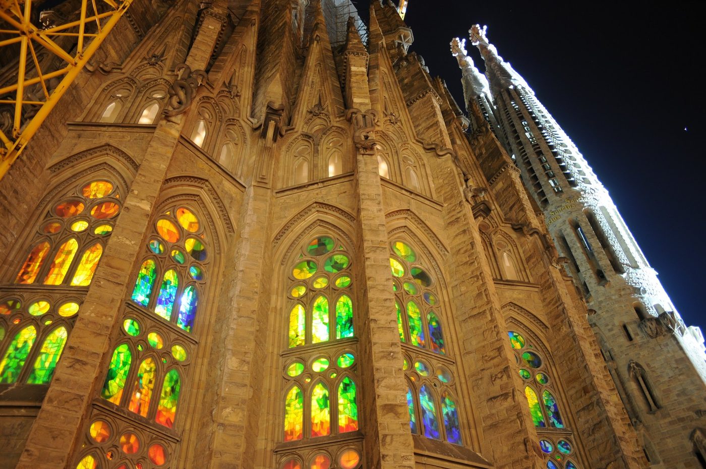 Stained glass lit from inside, seen outside at night