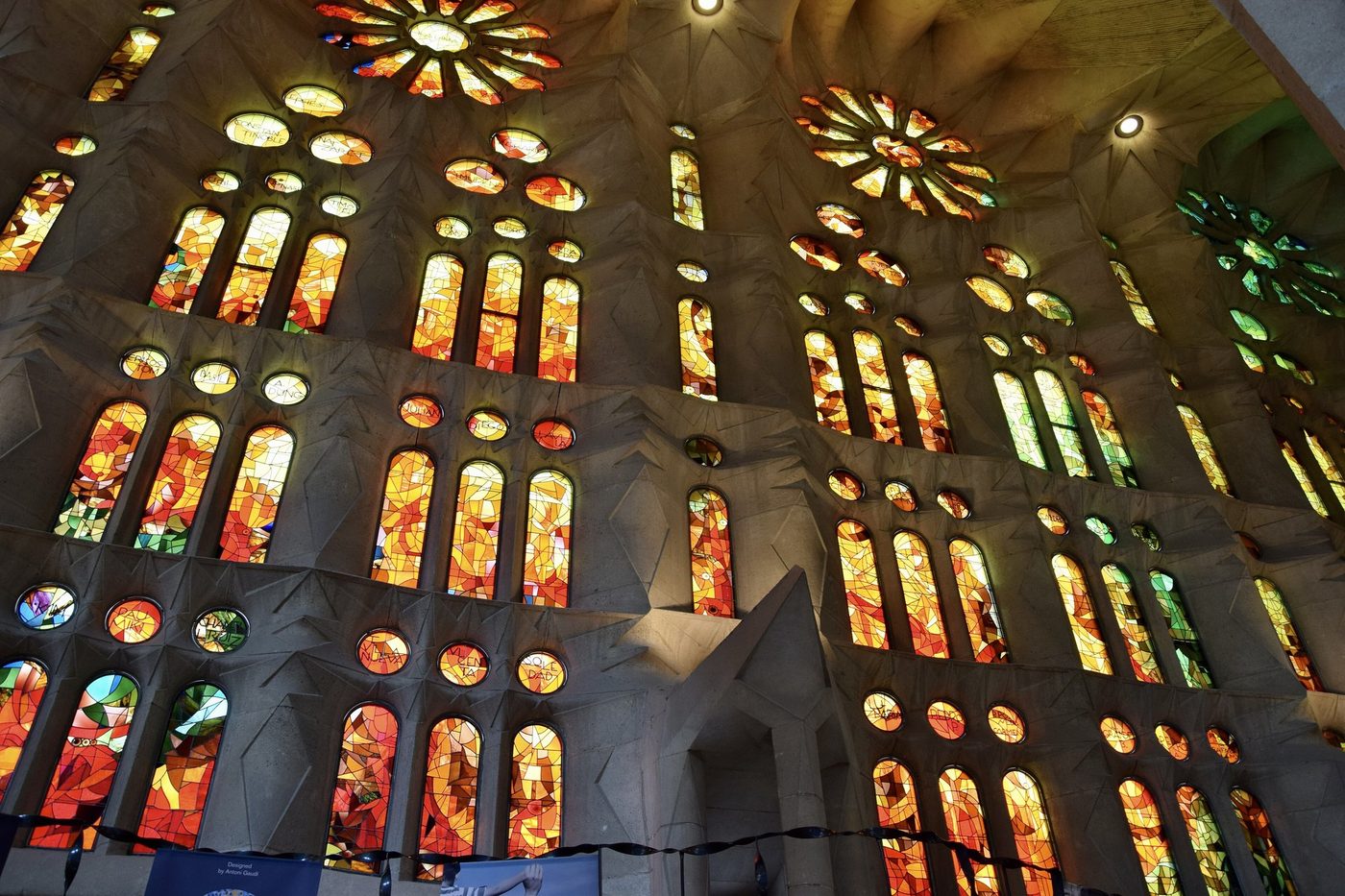 Orange and red stained glass on the western side.