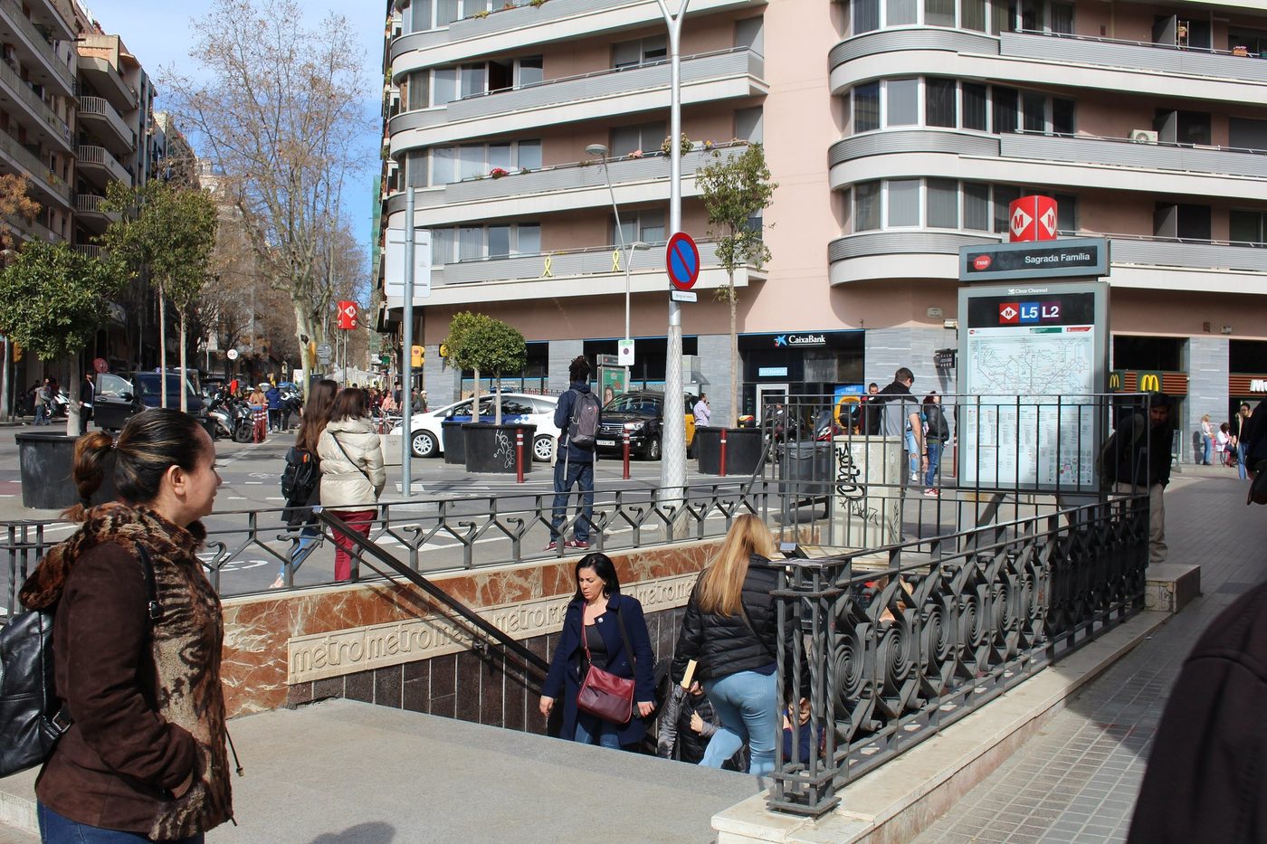 Metro entrance stairs on the street beside the Basilica.