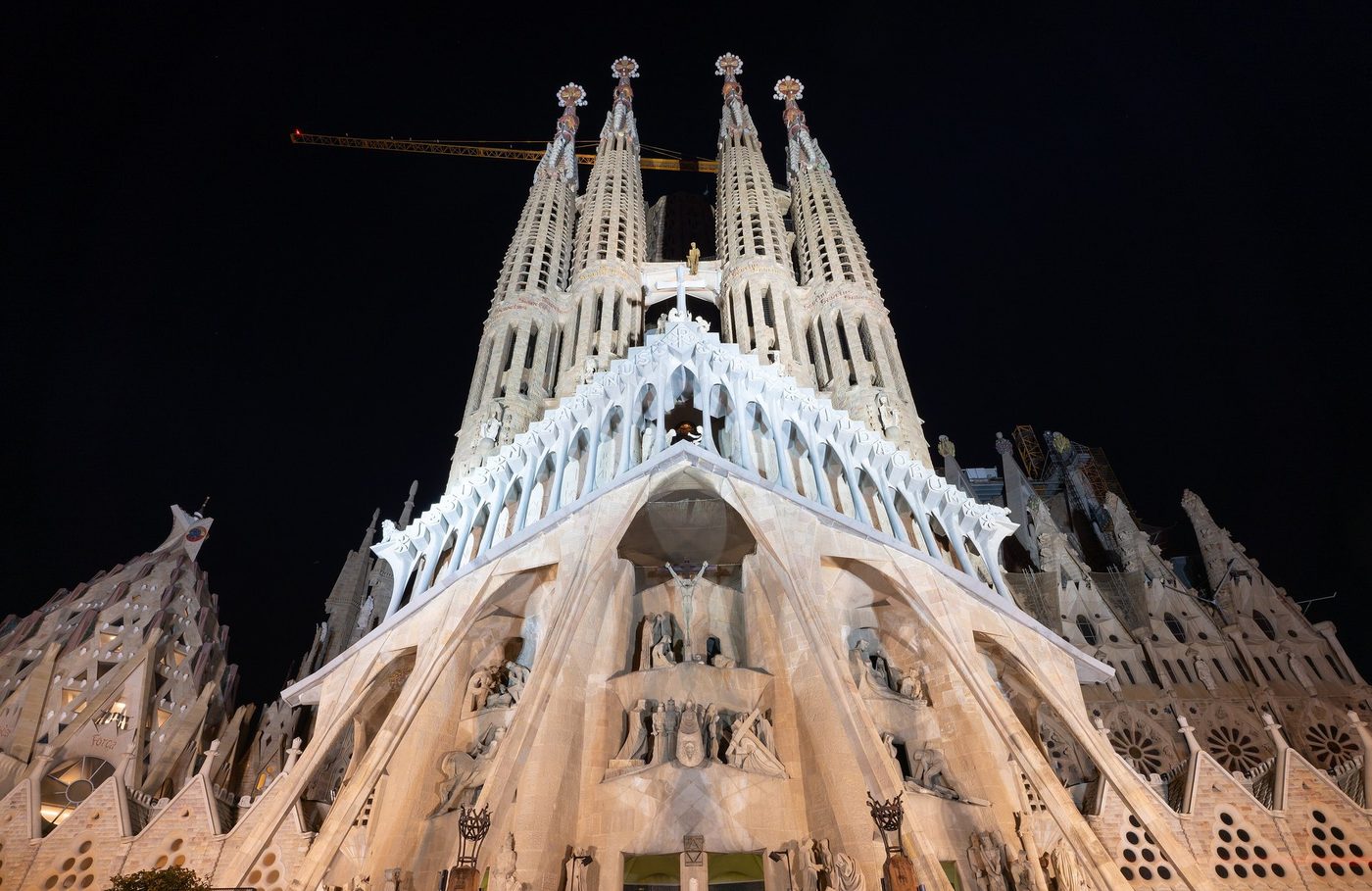 The Passion façade lit at night